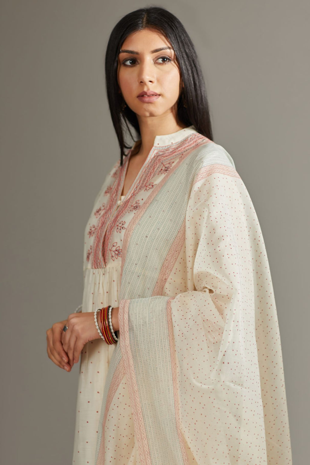 Hand block printed kurta set detailed with quilted embroidery.