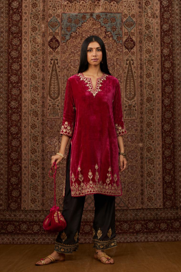 Fuchsia silk velvet short kurta with gold gota and zari embroidery.