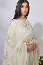 Off white straight kurta set detailed with gota and zari embroidery