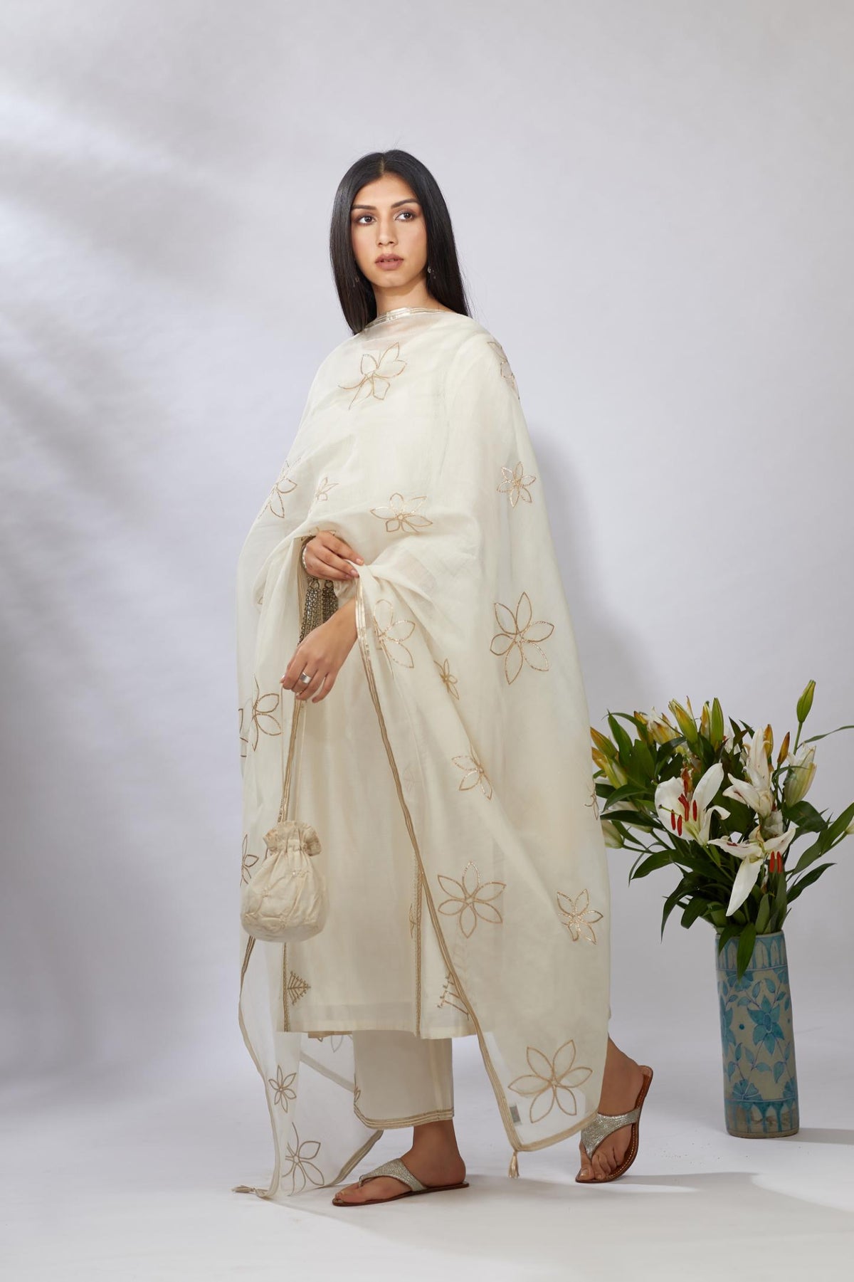 Off white straight kurta set detailed with gota and zari embroidery