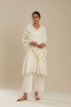 Cotton chanderi easy fit short V neck kurta set with tonal silk thread embroidery, highlighted with sequin and beads.