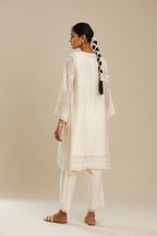 Cotton chanderi easy fit short V neck kurta set with tonal silk thread embroidery, highlighted with sequin and beads.