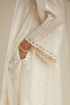 Cotton chanderi easy fit short V neck kurta set with tonal silk thread embroidery, highlighted with sequin and beads.