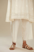 Cotton chanderi easy fit short V neck kurta set with tonal silk thread embroidery, highlighted with sequin and beads.
