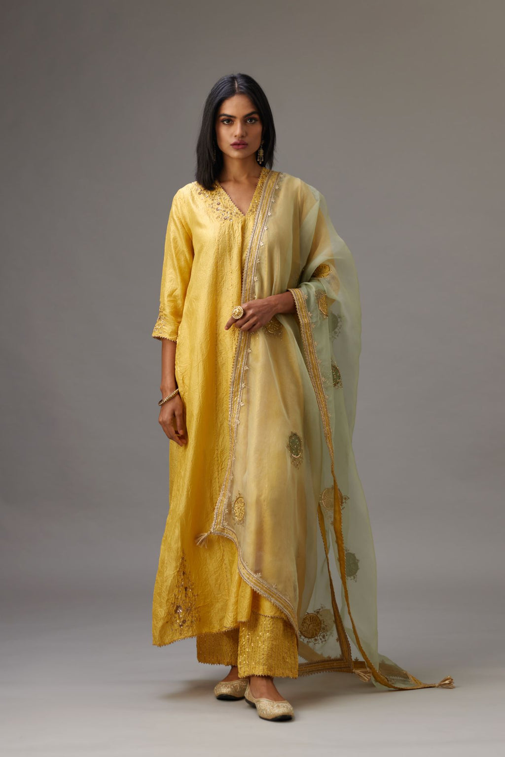 Yellow hand crushed silk kurta dress set with a V neck embroidered yoke and panels.