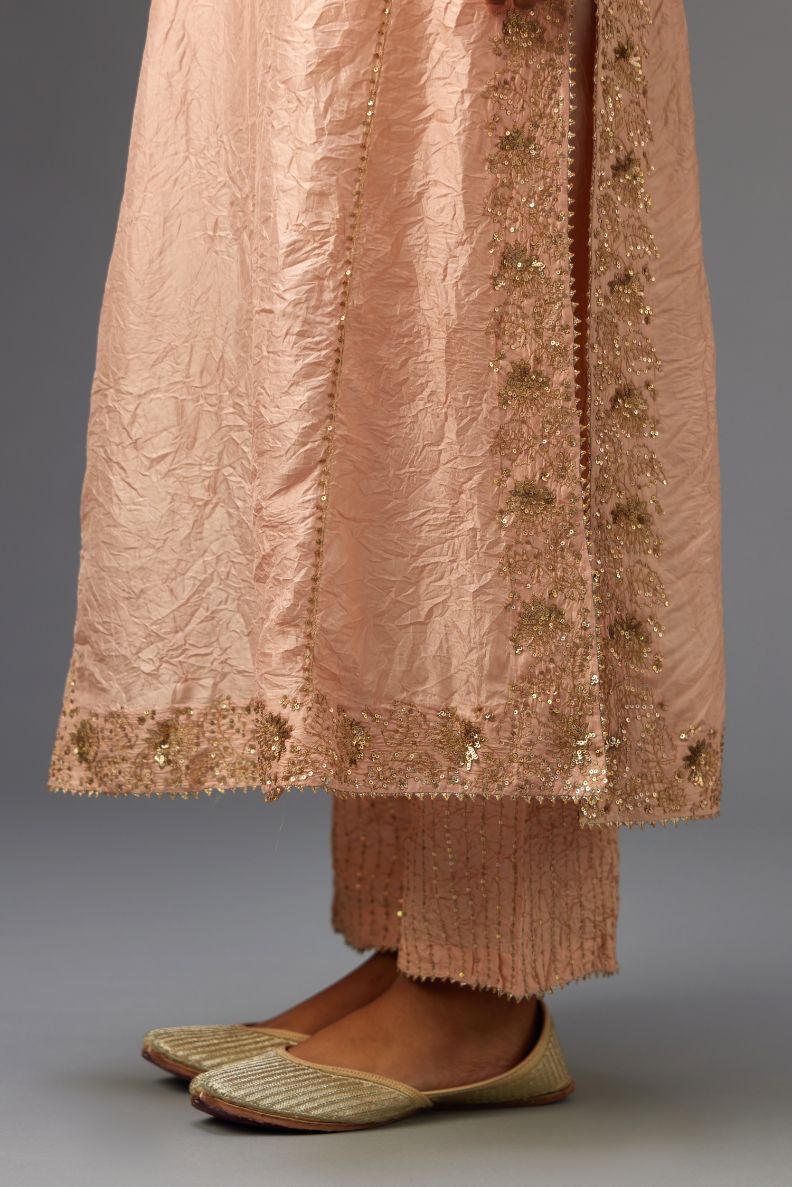 Pink hand crushed kalidar straight kurta set with gold sequins and zari handwork.