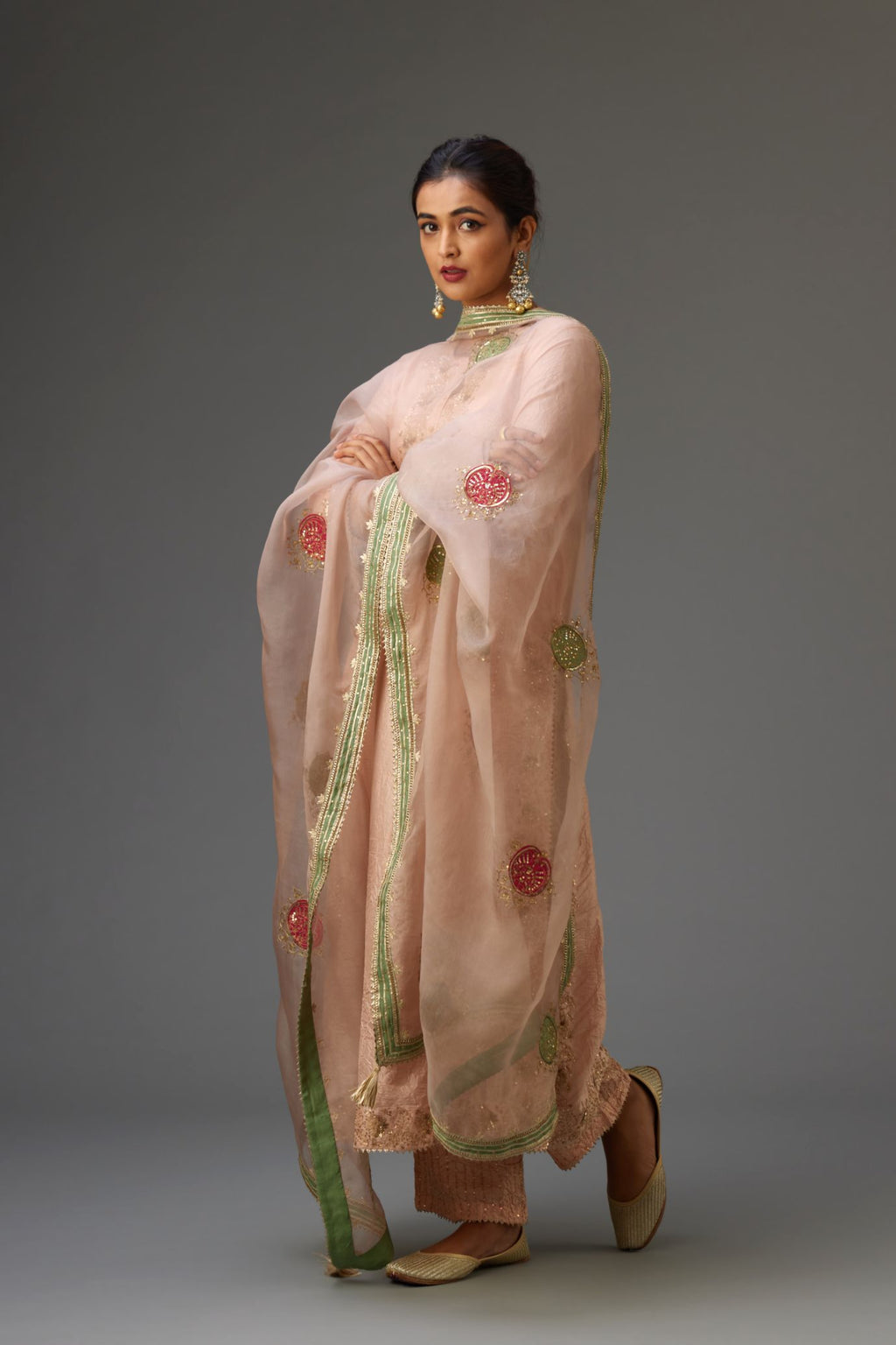 Pink hand crushed kalidar straight kurta set with gold sequins and zari handwork.