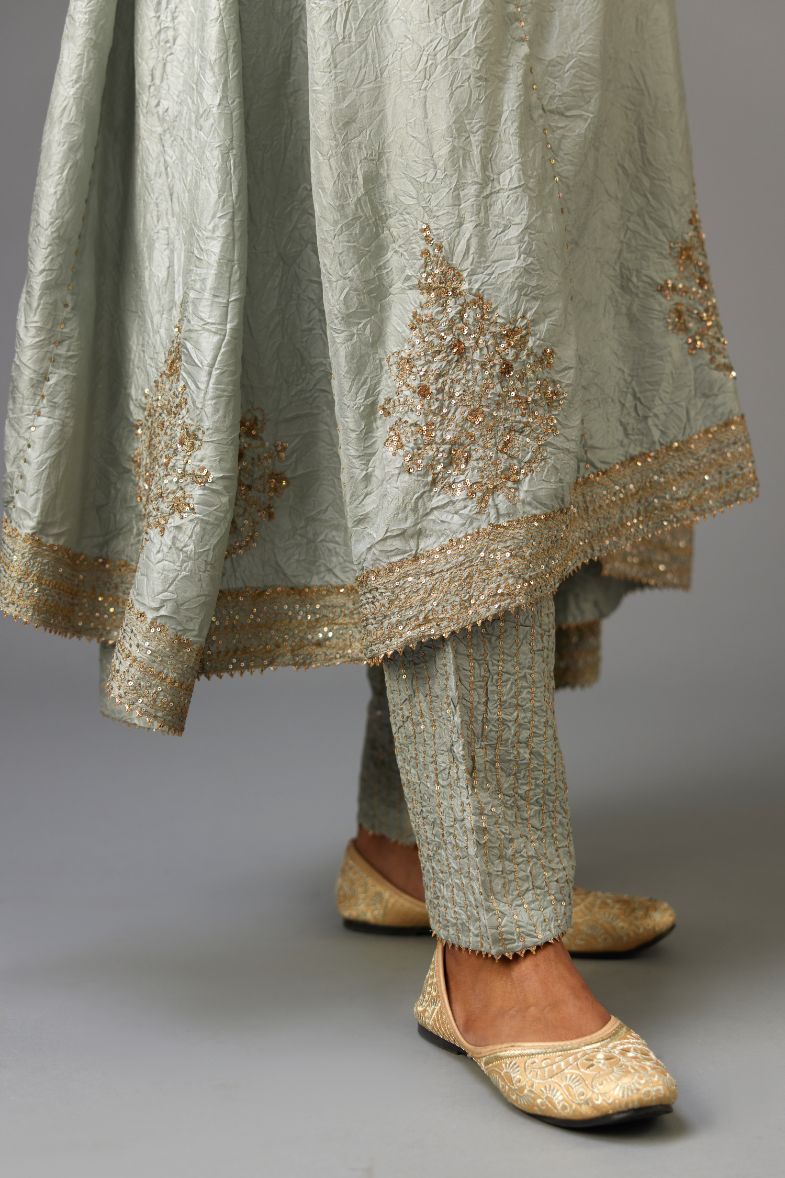 Blue silk hand crushed easy fit kurta set with golden sequins bootas at hem.