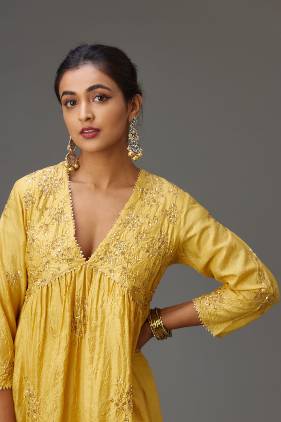 Yellow silk hand crushed V neck gathered kurta set, highlighted with all-over gold sequins boota.