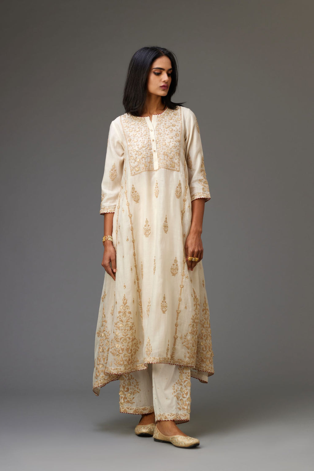 Off white A-line long kurta set with all-over dori, sequins and gota embroidery.