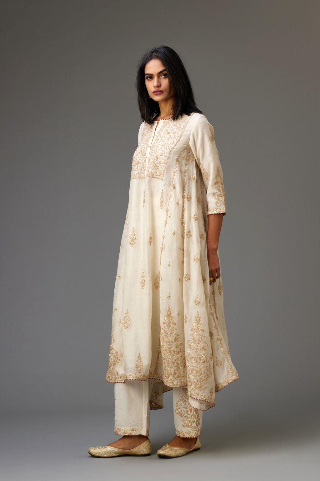 Off white A-line long kurta set with all-over dori, sequins and gota embroidery.