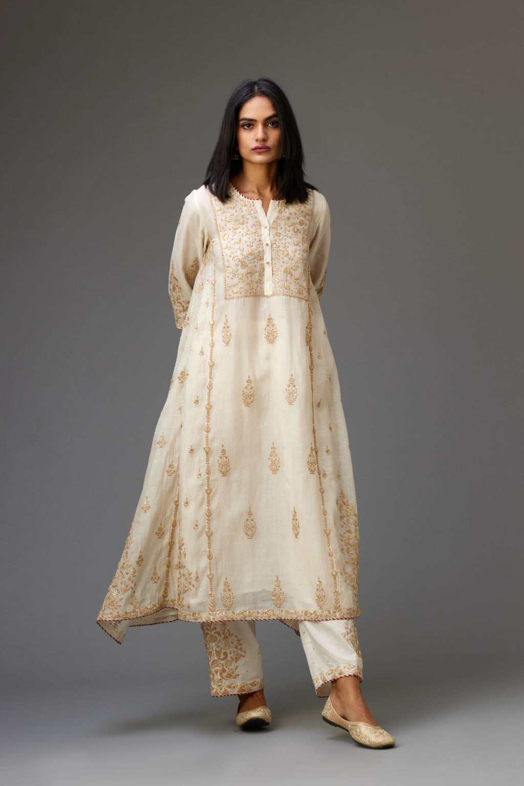 Off white A-line long kurta set with all-over dori, sequins and gota embroidery.