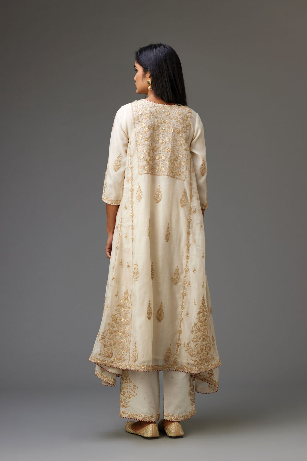 Off white A-line long kurta set with all-over dori, sequins and gota embroidery.