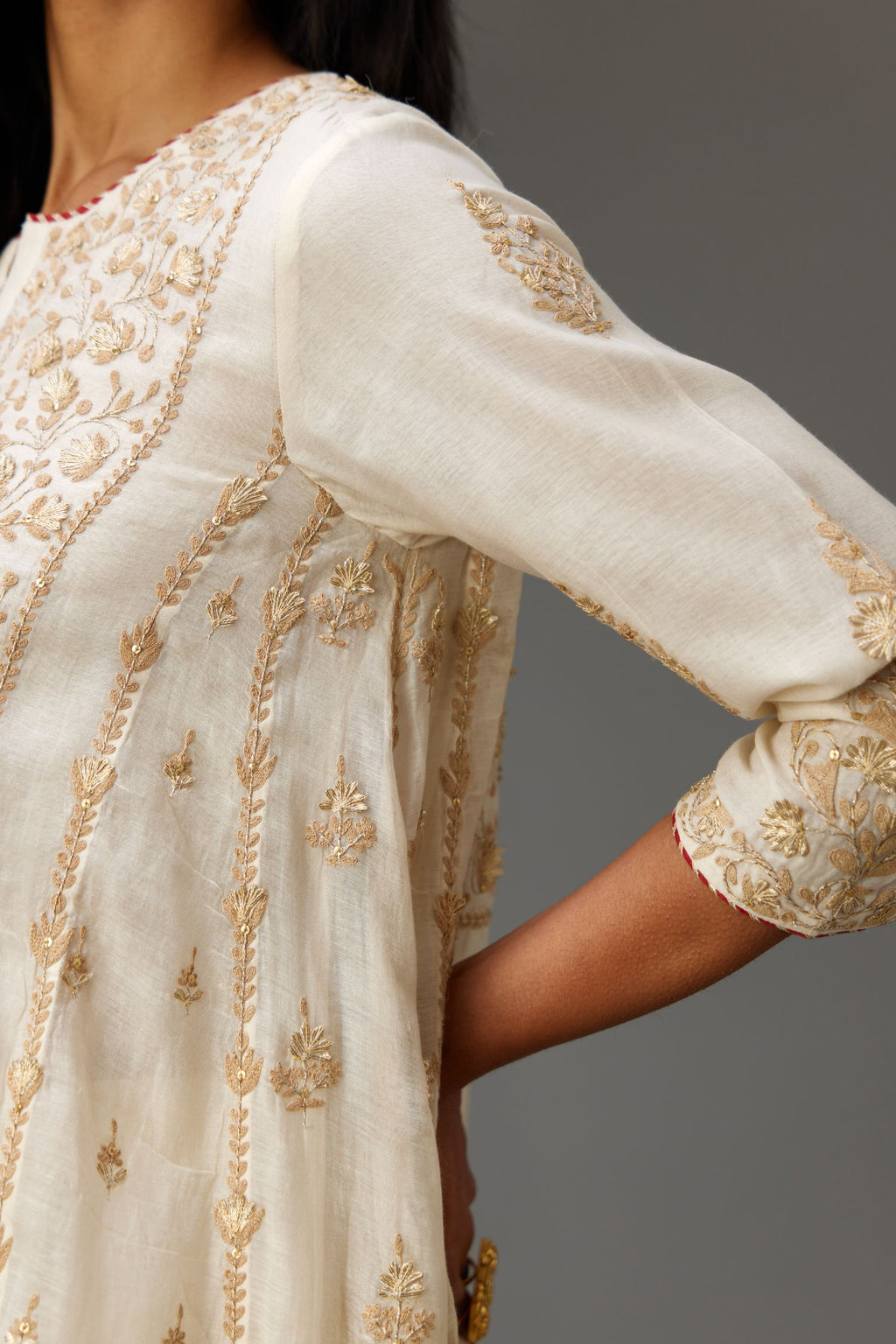 Off white A-line long kurta set with all-over dori, sequins and gota embroidery.