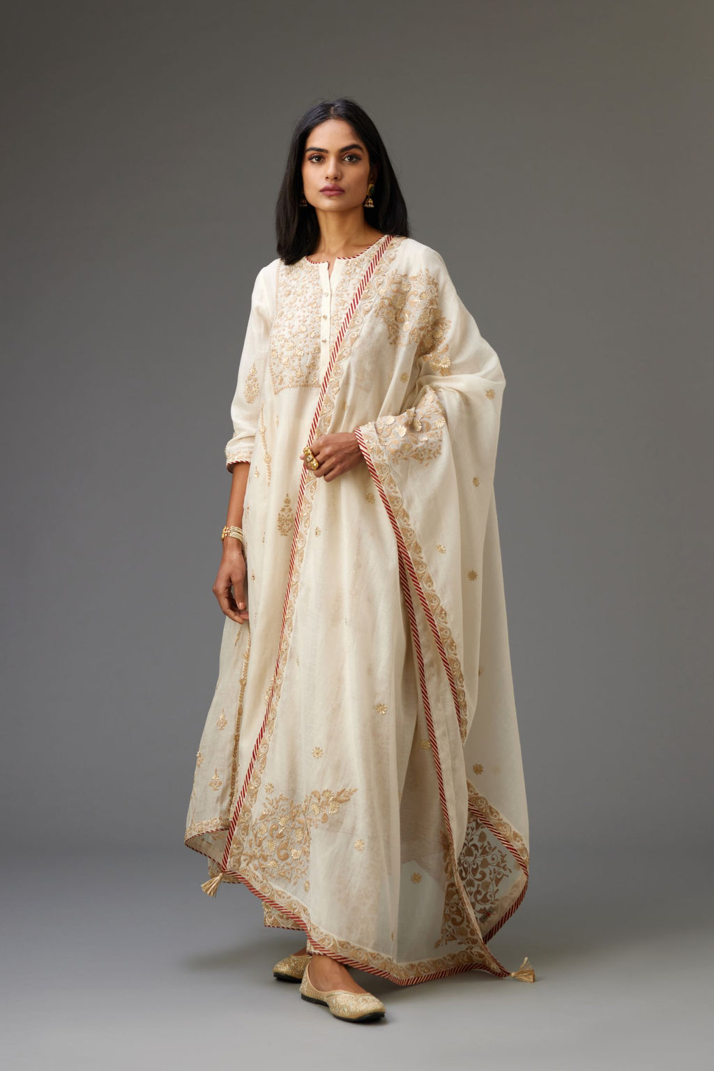 Off white A-line long kurta set with all-over dori, sequins and gota embroidery.