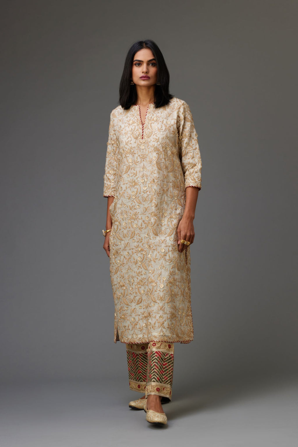 Off white cotton chanderi straight kurta set with all-over dori and gota jaal embroidery, highlighted with gold sequin work.