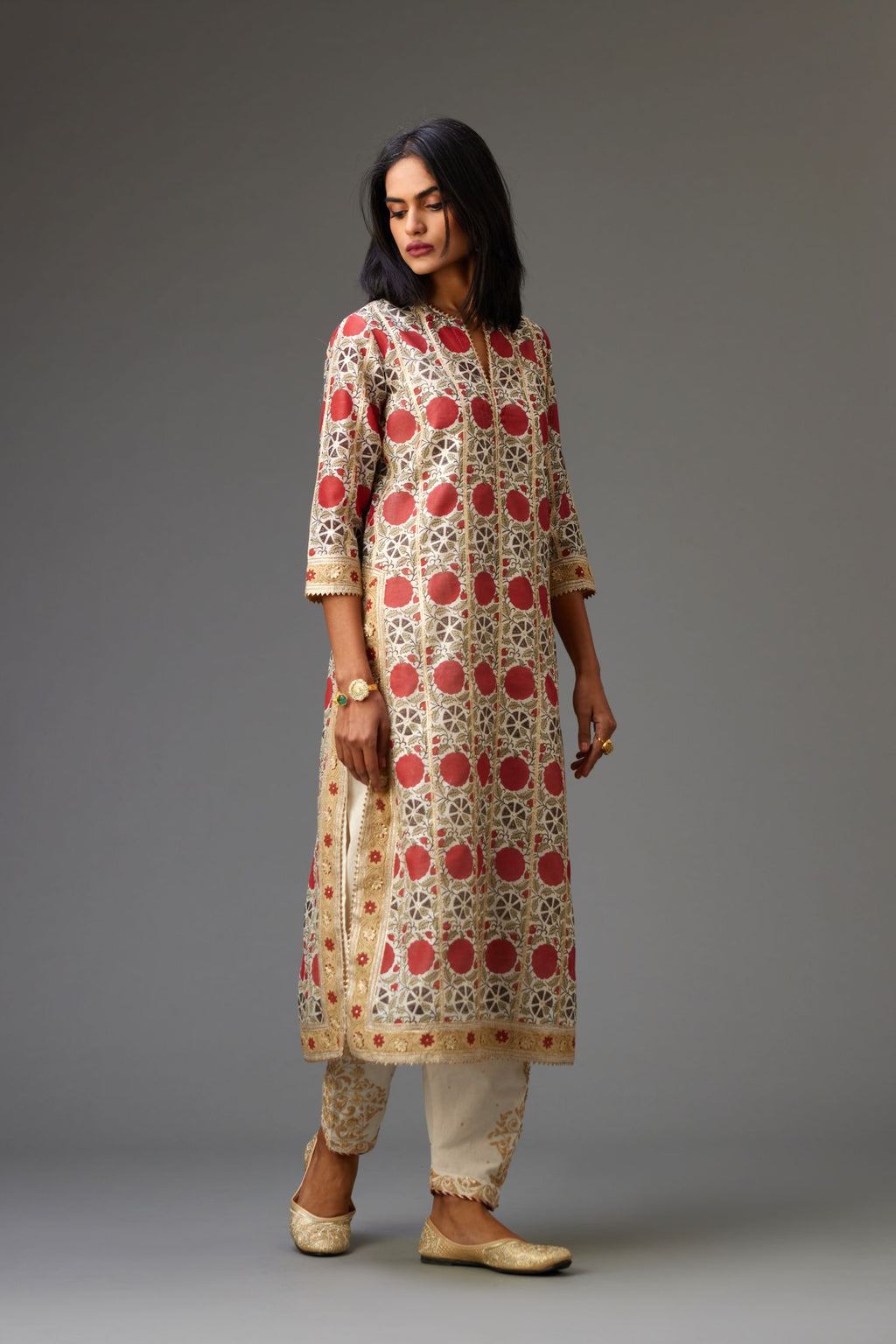 Red and off-white hand block printed straight kurta set with all-over gota detailing.
