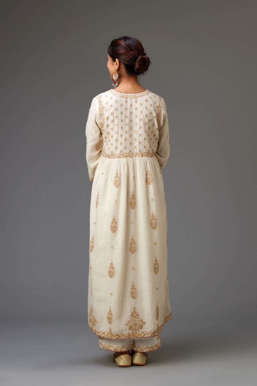 Off white cotton chanderi kurta-dress set with dori and gota embroidery, highlighted with gold sequins work.
