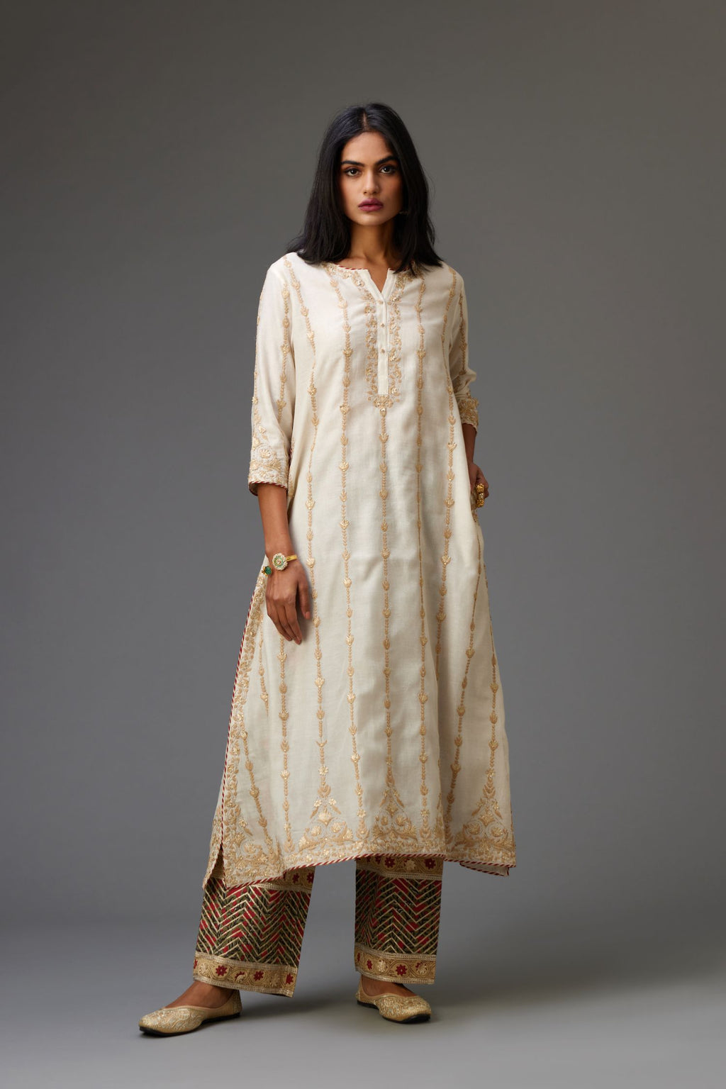 Off white cotton chanderi straight kurta set with all over heavy dori and gota embroidery work, highlighted with gold sequin work.