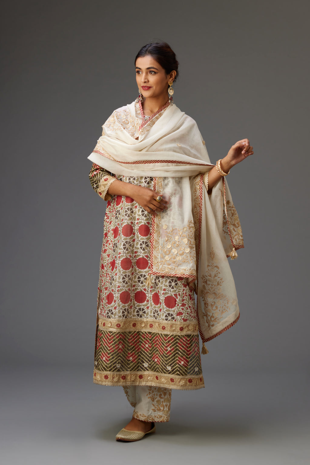 Off-white cotton chanderi dupatta with dori and gota embroidery at edges, highlighted with gold sequins.