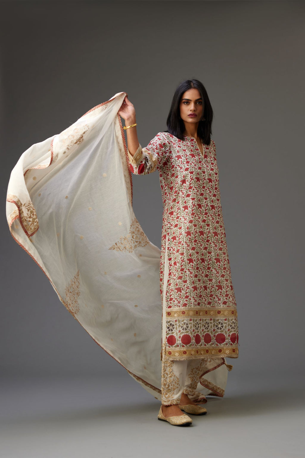Silk chanderi hand block printed straight kurta set with all-over gota detailing.