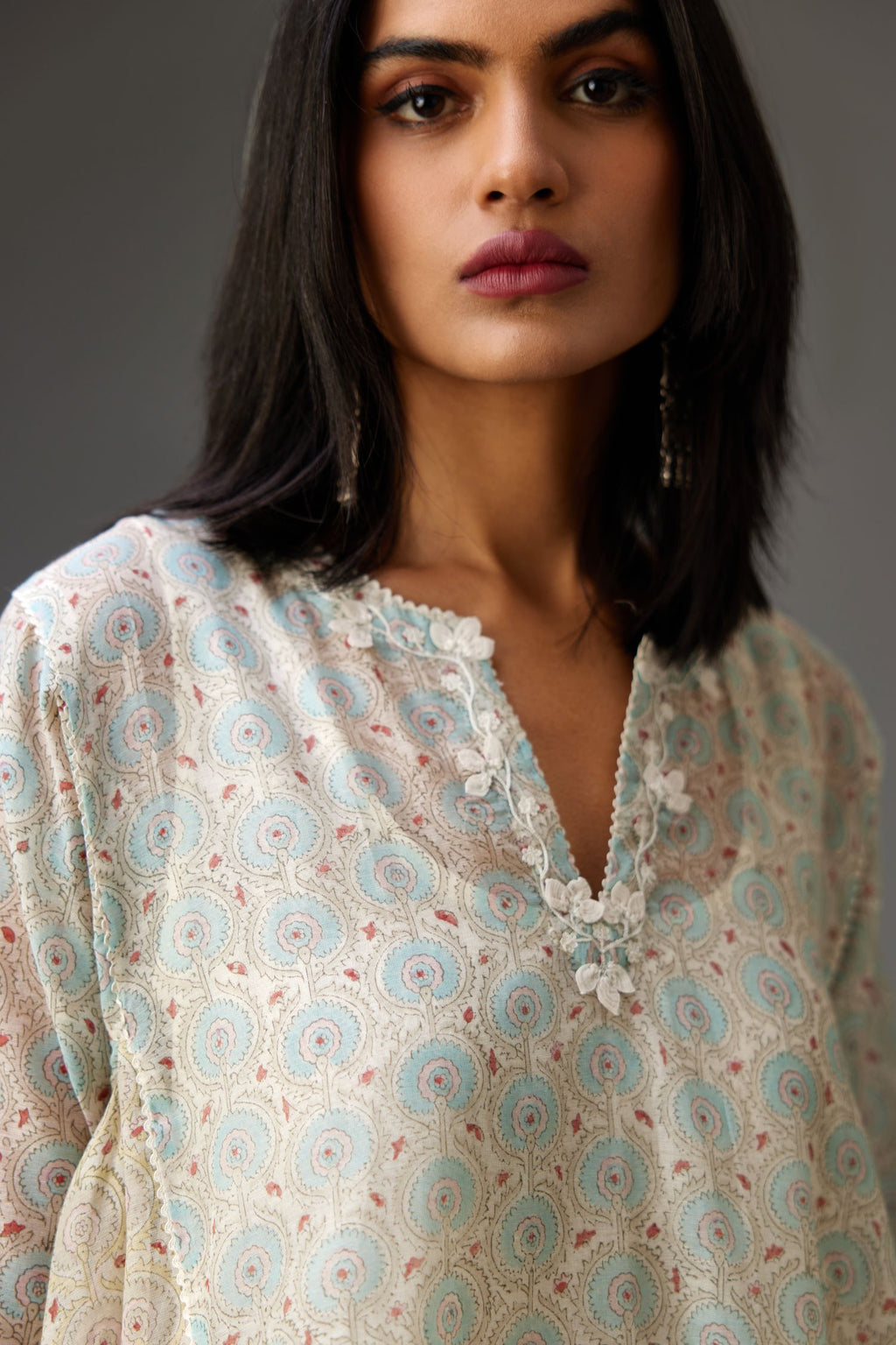 Mixed print easy fit, asymmetric hem, hand-block printed panelled kurta set with off-white embroidery, highlighted with ric rac.