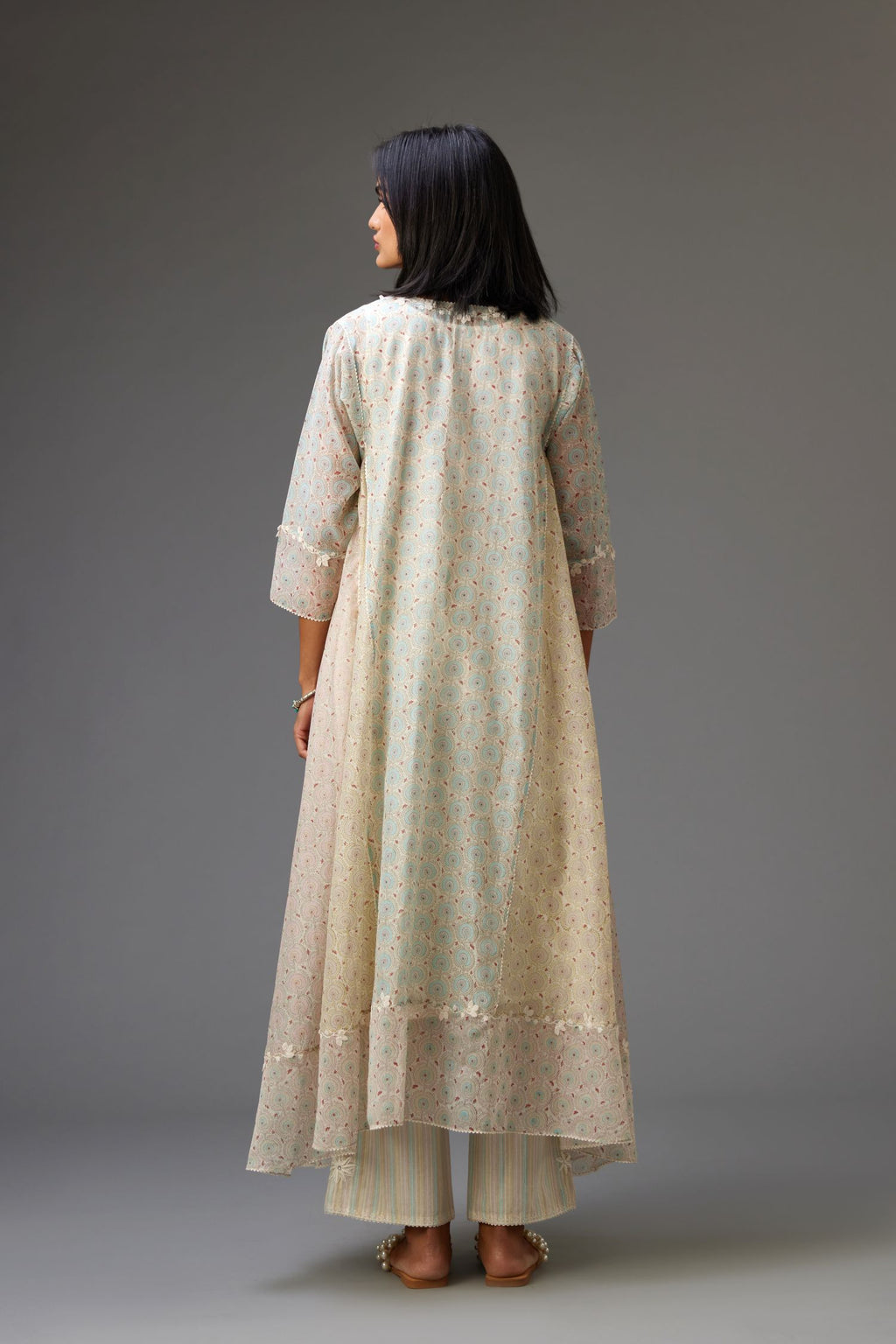 Mixed print easy fit, asymmetric hem, hand-block printed panelled kurta set with off-white embroidery, highlighted with ric rac.