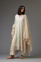 Mixed print easy fit, asymmetric hem, hand-block printed panelled kurta set with off-white embroidery, highlighted with ric rac.
