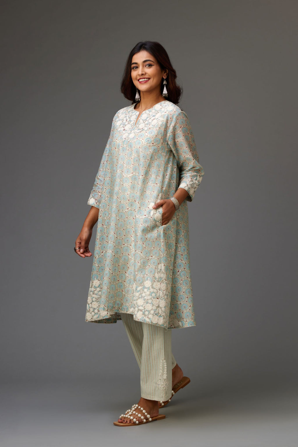 Blue & grey hand block printed short A-line kurta set with appliqué embroidery, highlighted with ric rac lace and sequins.