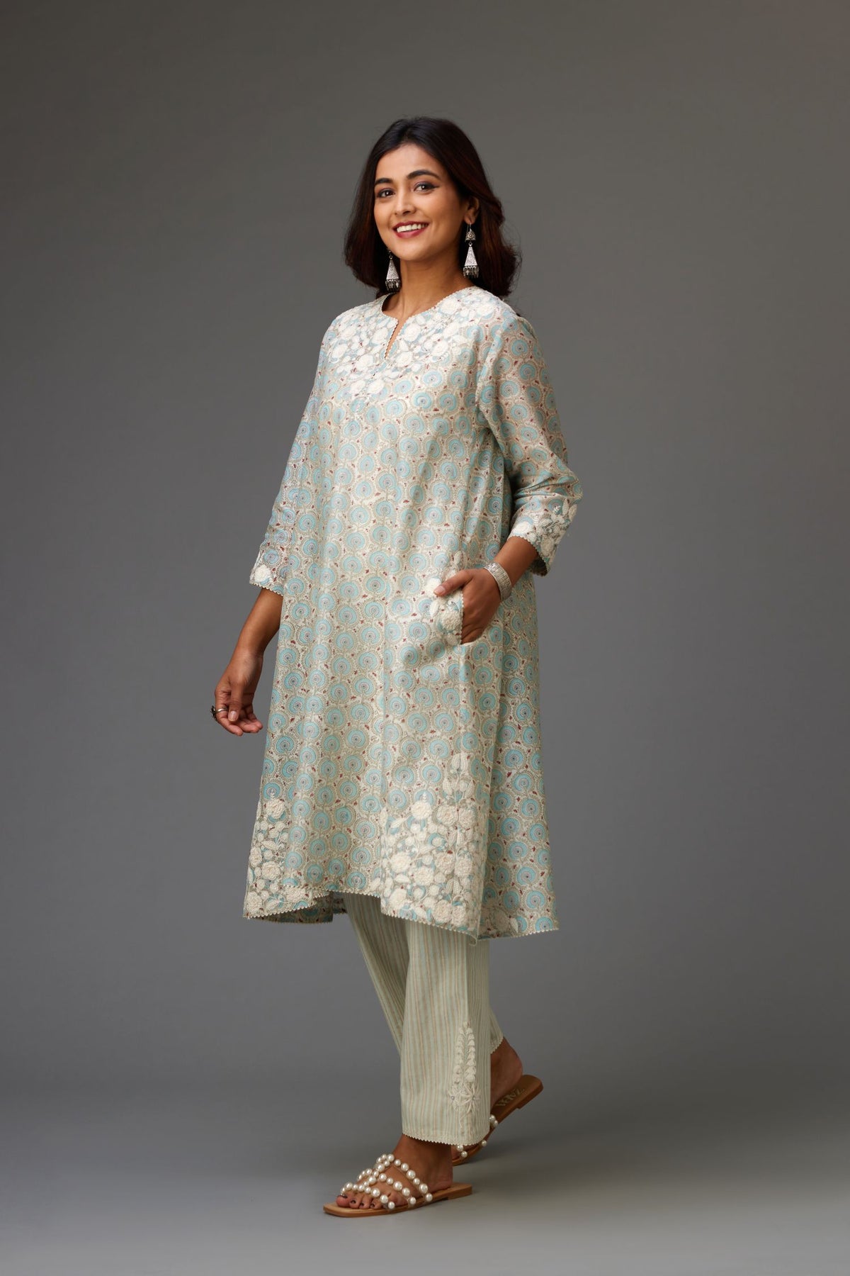 Blue & grey hand block printed short A-line kurta set with appliqué embroidery, highlighted with ric rac lace and sequins.
