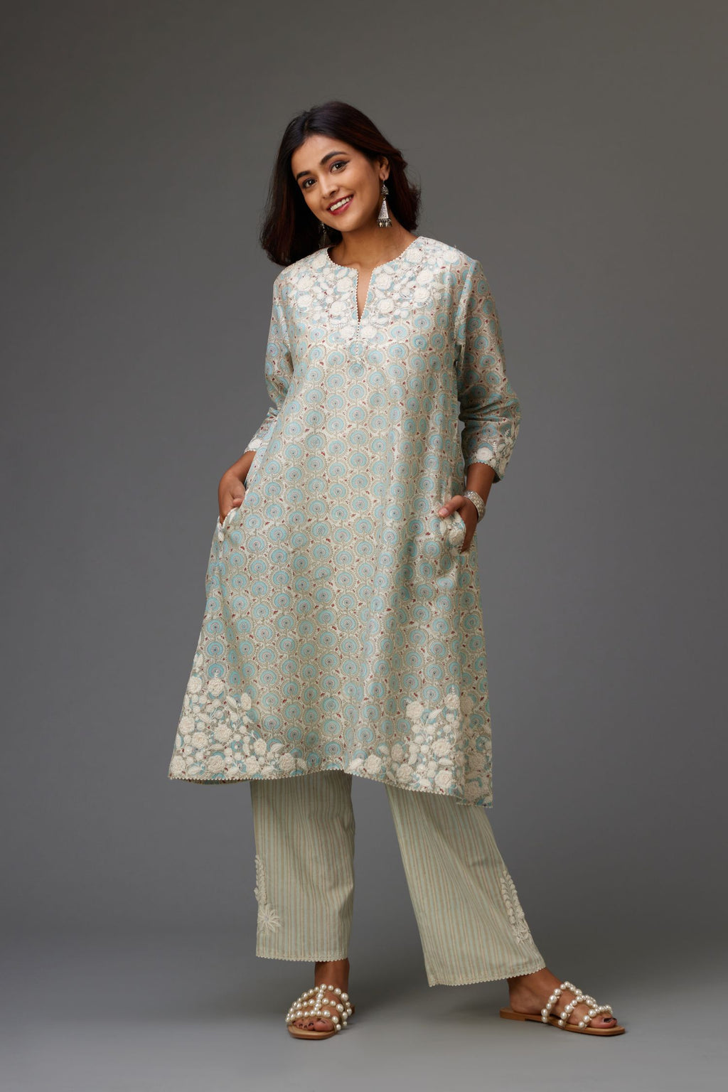Blue & grey hand block printed short A-line kurta set with appliqué embroidery, highlighted with ric rac lace and sequins.