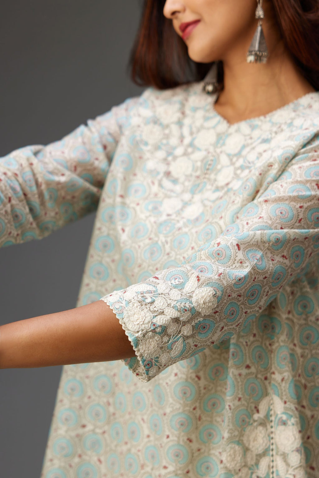 Blue & grey hand block printed short A-line kurta set with appliqué embroidery, highlighted with ric rac lace and sequins.