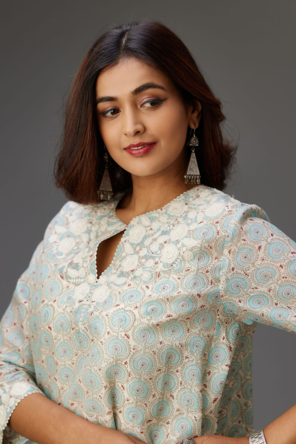 Blue & grey hand block printed short A-line kurta set with appliqué embroidery, highlighted with ric rac lace and sequins.