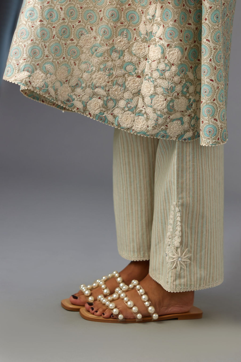 Blue & grey hand block printed short A-line kurta set with appliqué embroidery, highlighted with ric rac lace and sequins.
