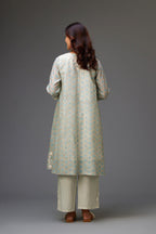 Blue & grey hand block printed short A-line kurta set with appliqué embroidery, highlighted with ric rac lace and sequins.