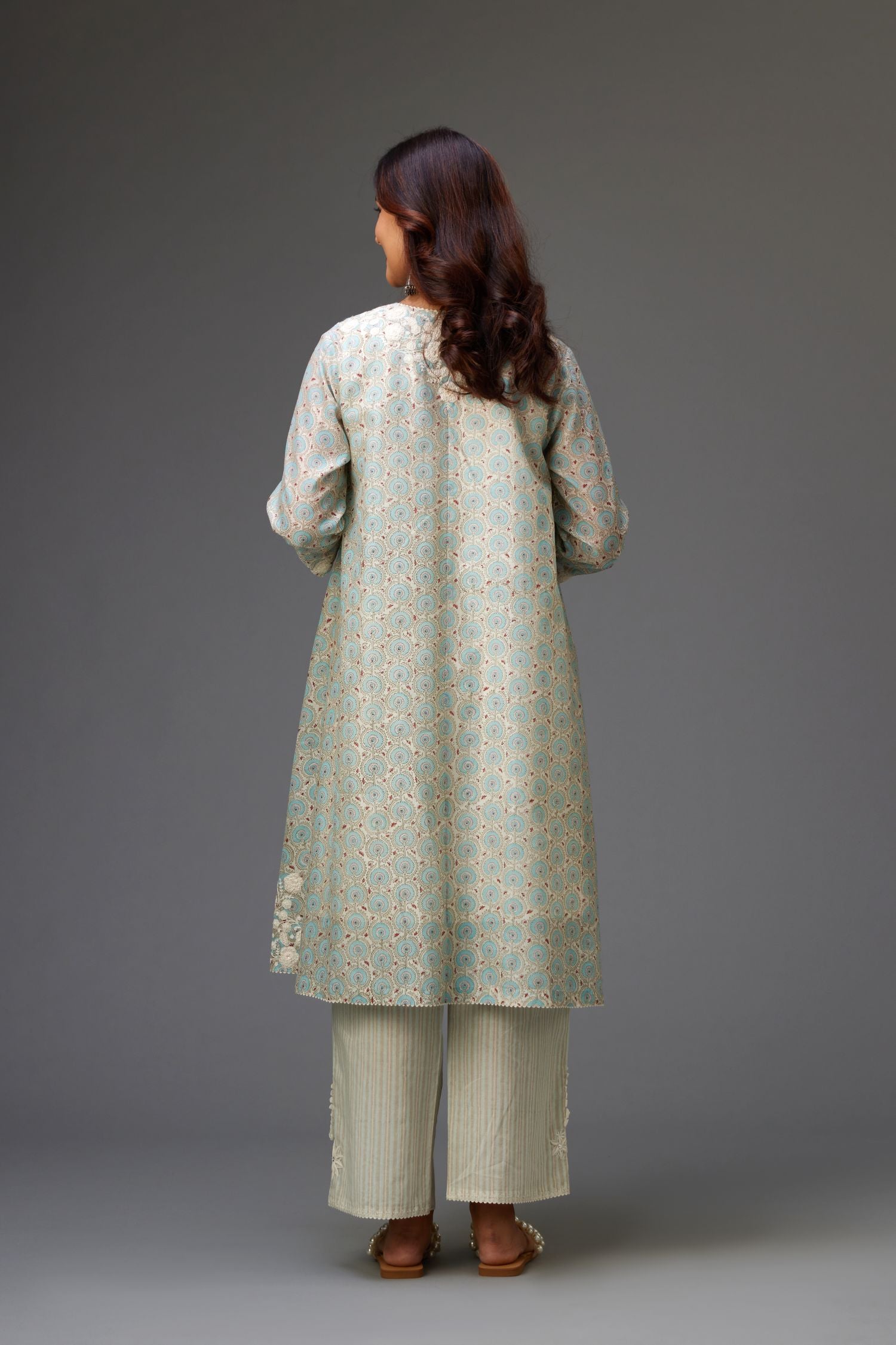 Blue & grey hand block printed short A-line kurta set with appliqué embroidery, highlighted with ric rac lace and sequins.