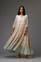 Mixed-print hand-block printed tiered kurta set with thread embroidery, highlighted with sequins.