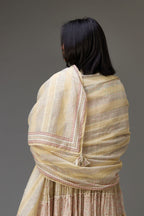 Mixed-print hand-block printed tiered kurta set with thread embroidery, highlighted with sequins.