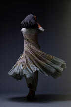 Mixed-print hand-block printed tiered kurta set with thread embroidery, highlighted with sequins.
