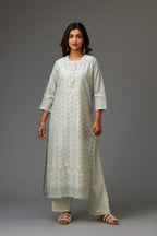 Silk chanderi hand-block printed straight kurta set with sequins work and chiffon flower embroidery.