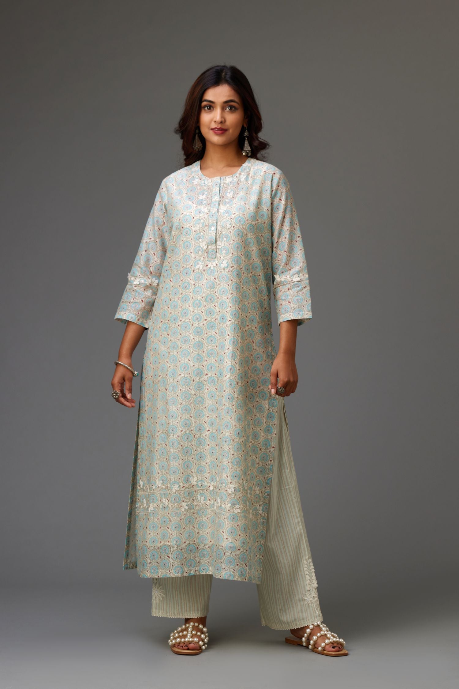 Silk chanderi hand-block printed straight kurta set with sequins work and chiffon flower embroidery.