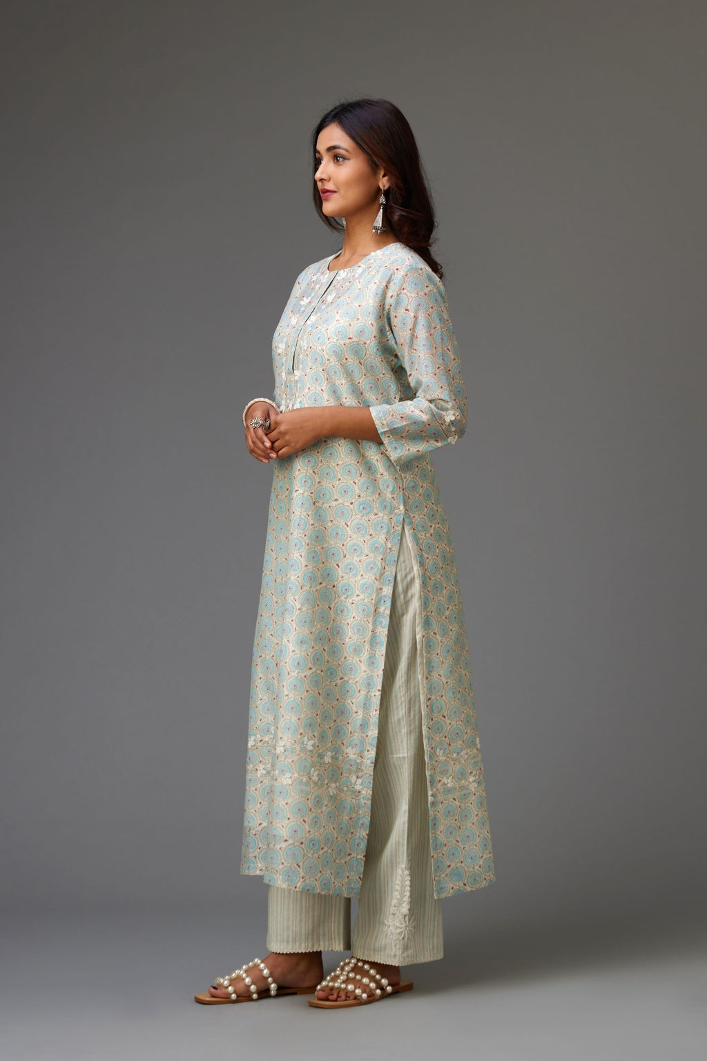 Silk chanderi hand-block printed straight kurta set with sequins work and chiffon flower embroidery.
