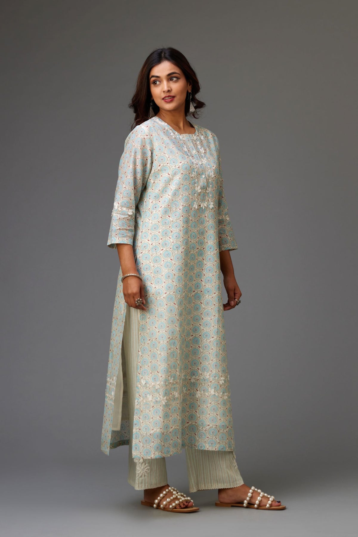 Silk chanderi hand-block printed straight kurta set with sequins work and chiffon flower embroidery.