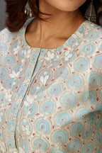 Silk chanderi hand-block printed straight kurta set with sequins work and chiffon flower embroidery.