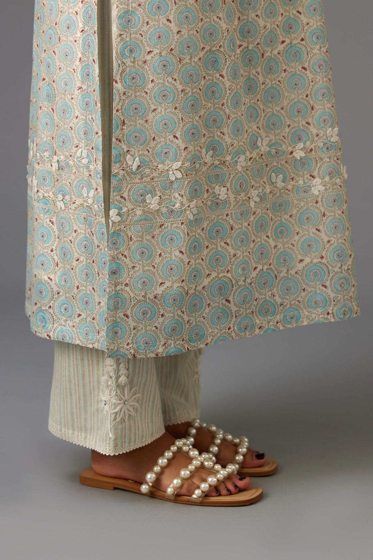 Silk chanderi hand-block printed straight kurta set with sequins work and chiffon flower embroidery.