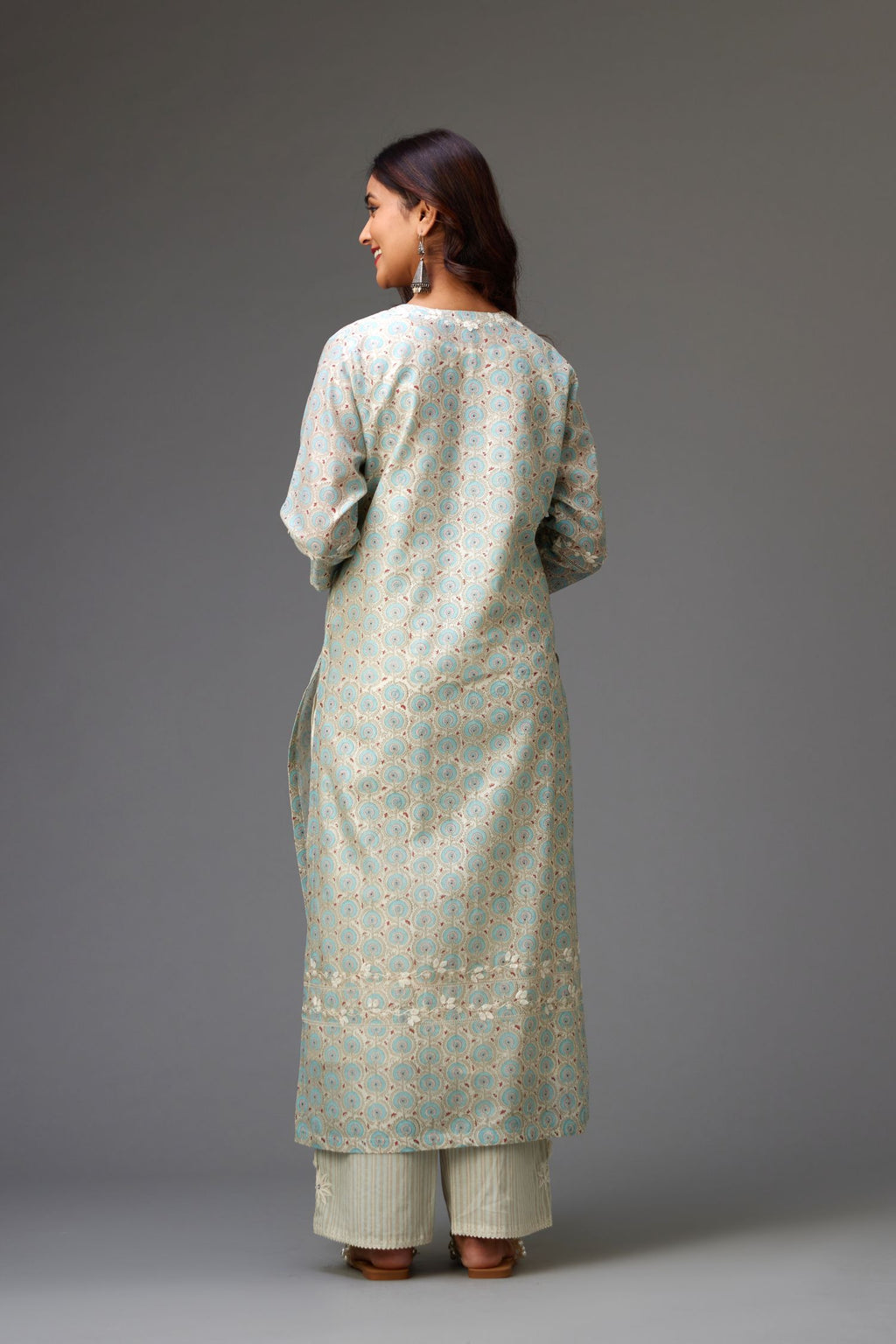 Silk chanderi hand-block printed straight kurta set with sequins work and chiffon flower embroidery.