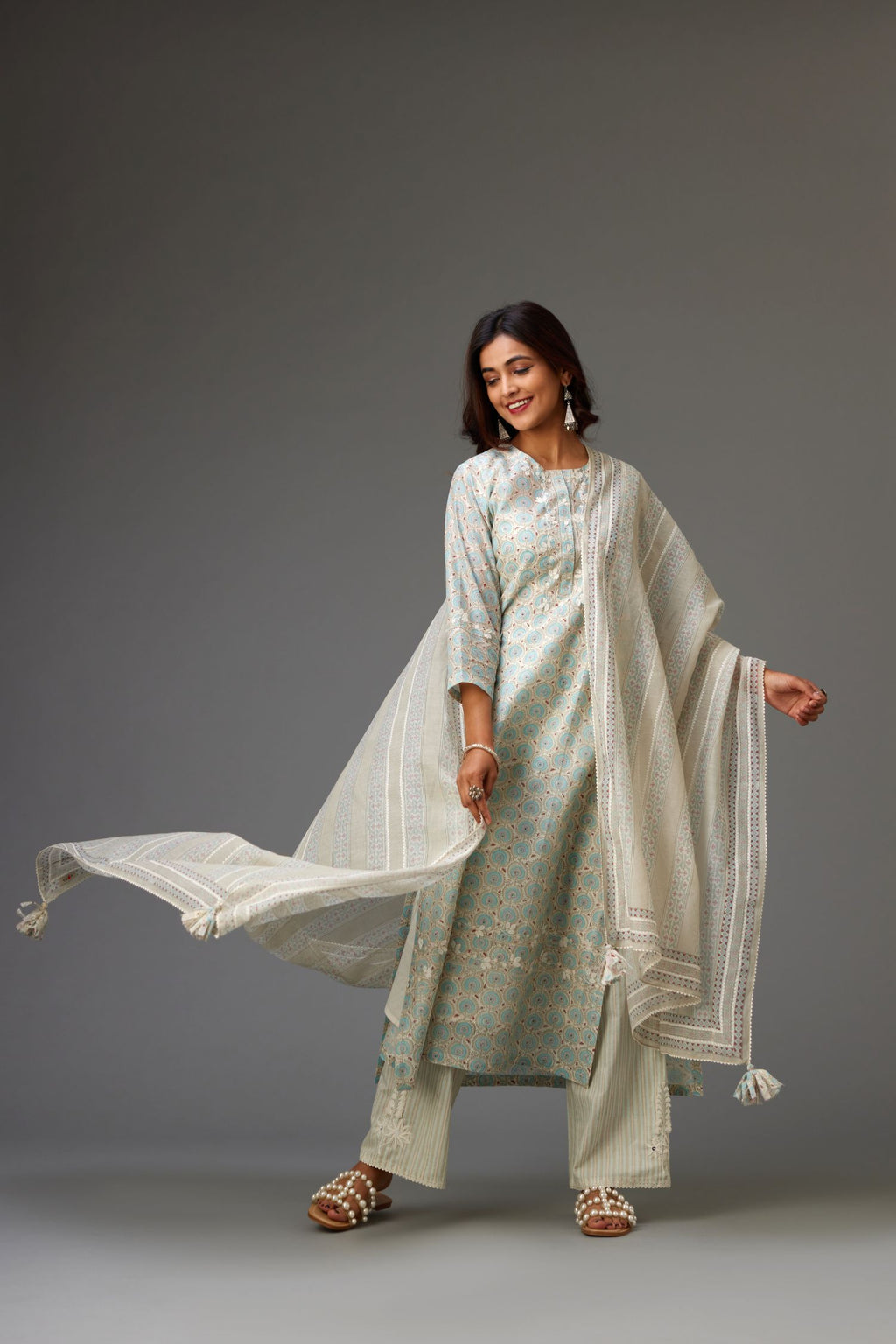 Silk chanderi hand-block printed straight kurta set with sequins work and chiffon flower embroidery.