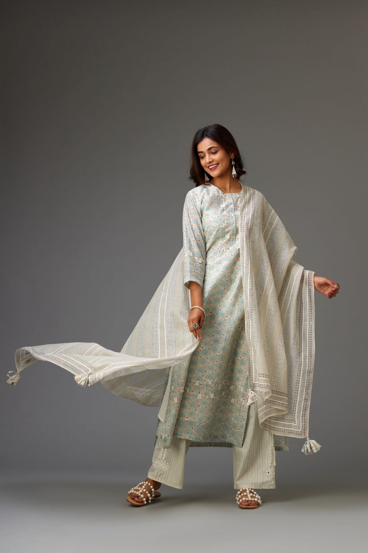 Silk chanderi hand-block printed straight kurta set with sequins work and chiffon flower embroidery.