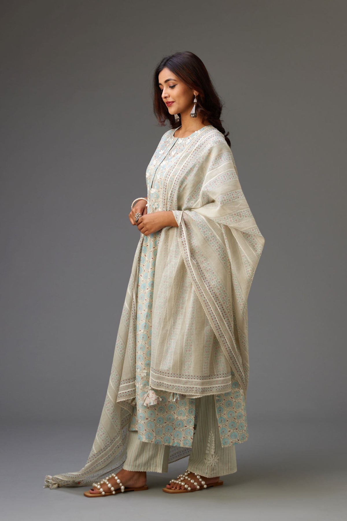 Silk chanderi hand-block printed straight kurta set with sequins work and chiffon flower embroidery.
