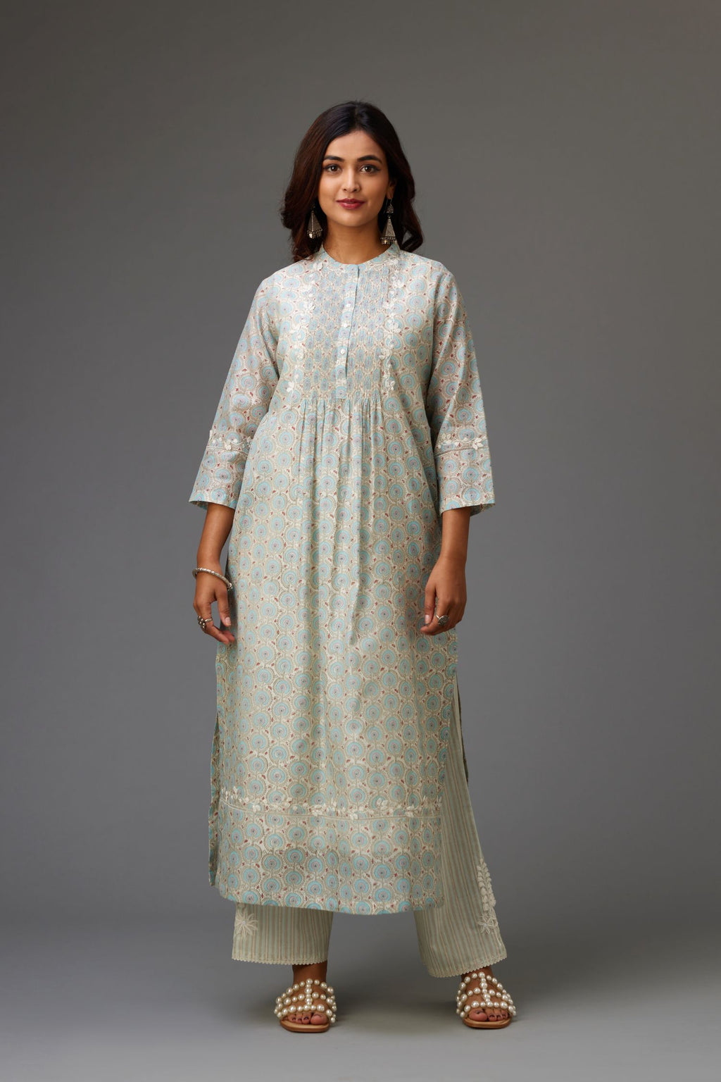 Silk chanderi blue and grey hand block printed straight kurta set highlighted with pin tucks at yoke.